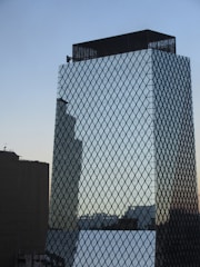 Modern high-rise commercial building in Dubai's financial district.