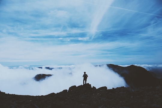 person on summit in Scafell Pike United Kingdom