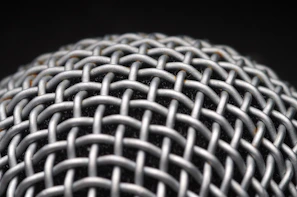 Close-up of a graphenated carbon nanotube mesh under a microscope revealing intricate nanostructures