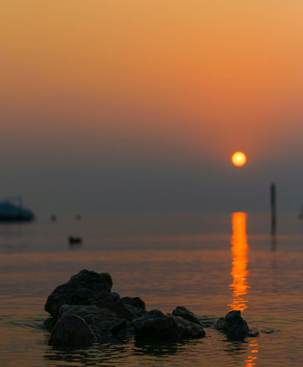 rocks at sea during golden hour