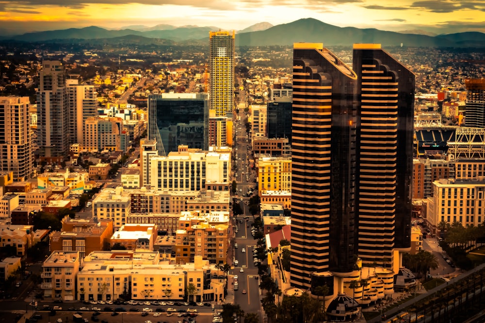 aerial photography of road in the middle of high-rise buildings