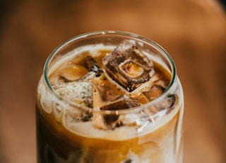 clear glass filled ice coffee