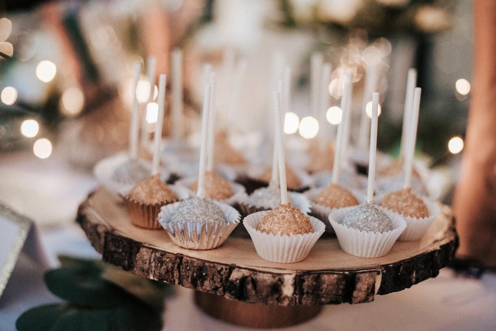 cupcakes on brown log tray