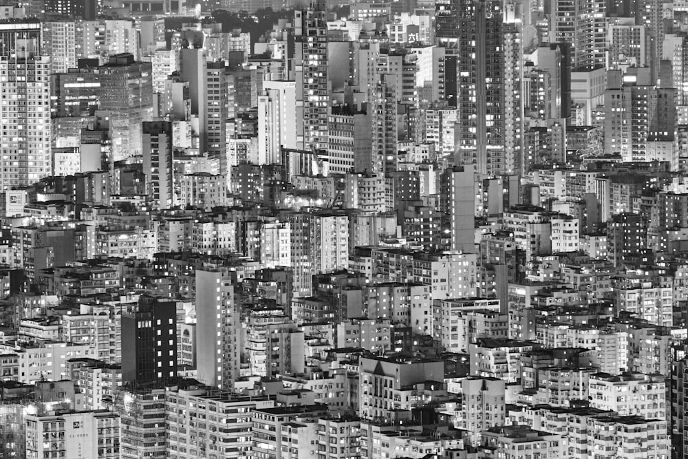 grayscale photo of city buildings