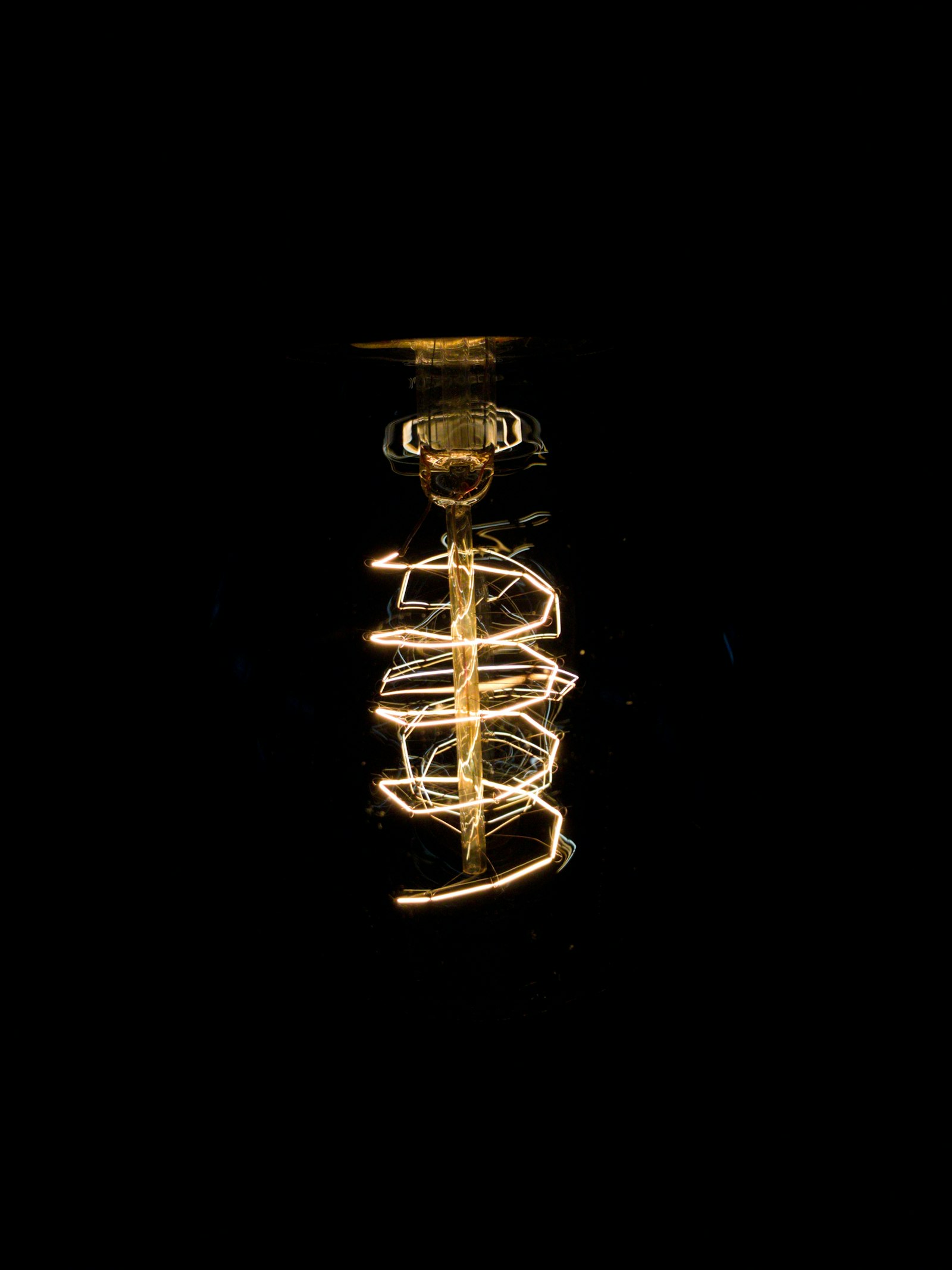 Apple iPhone sample photo. Turned on filament bulb photography