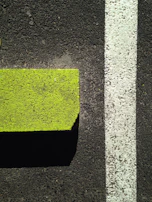 Sidewalk and driveway edges neatly sealed, highlighting attention to detail and precision.