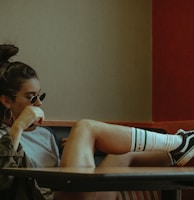 woman sitting on couch