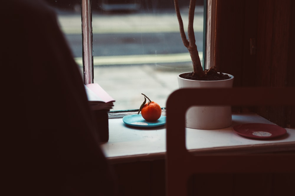 orange fruit on saucer