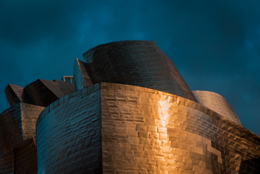 low angle photography of brown architectural building