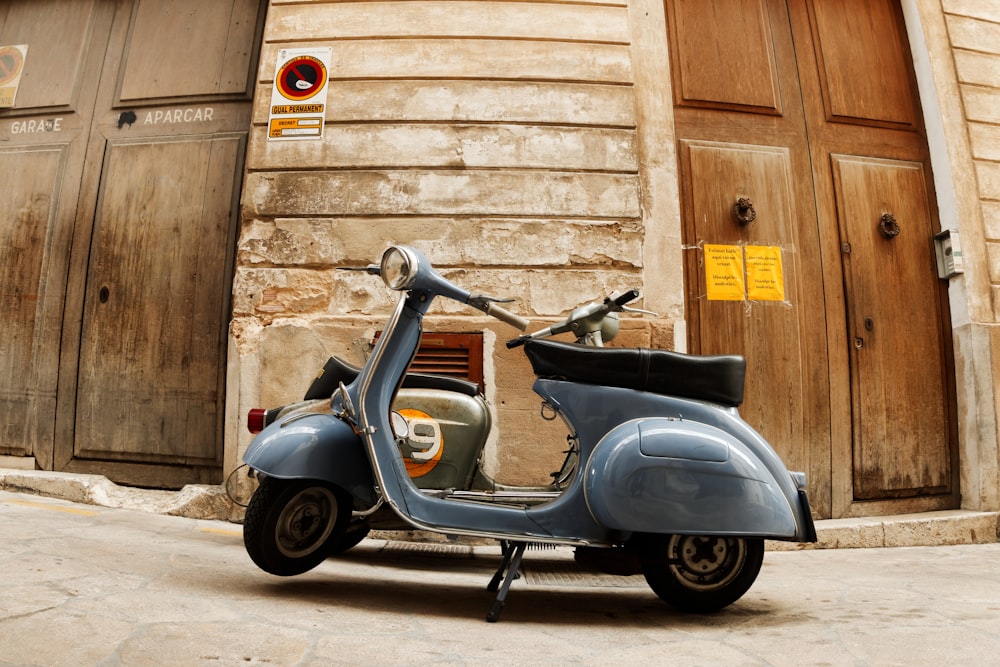 landscape photograph of classic gray motor scooter