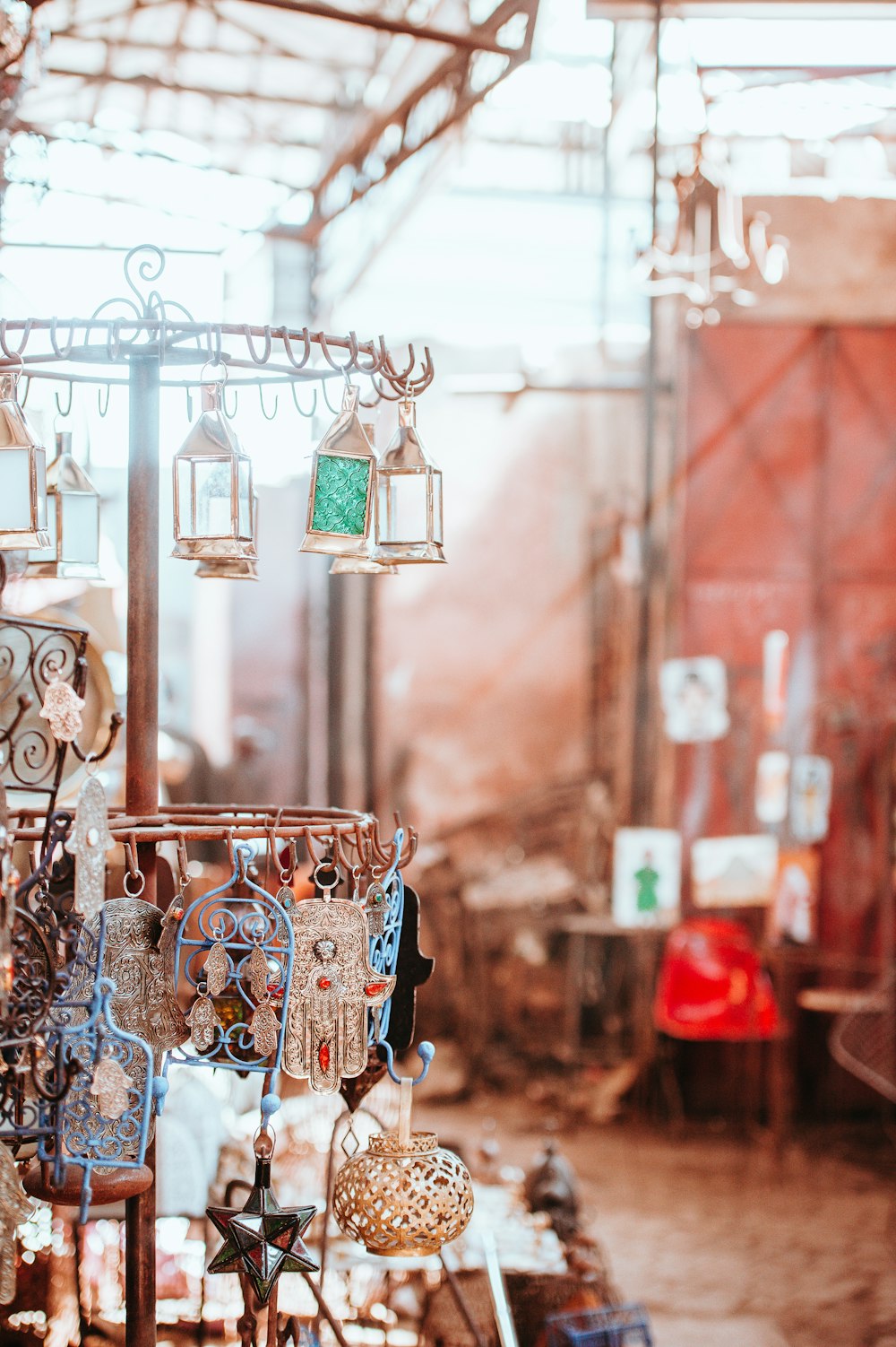 closeup selective focus photo of jewelry rotating rack with different design keychains