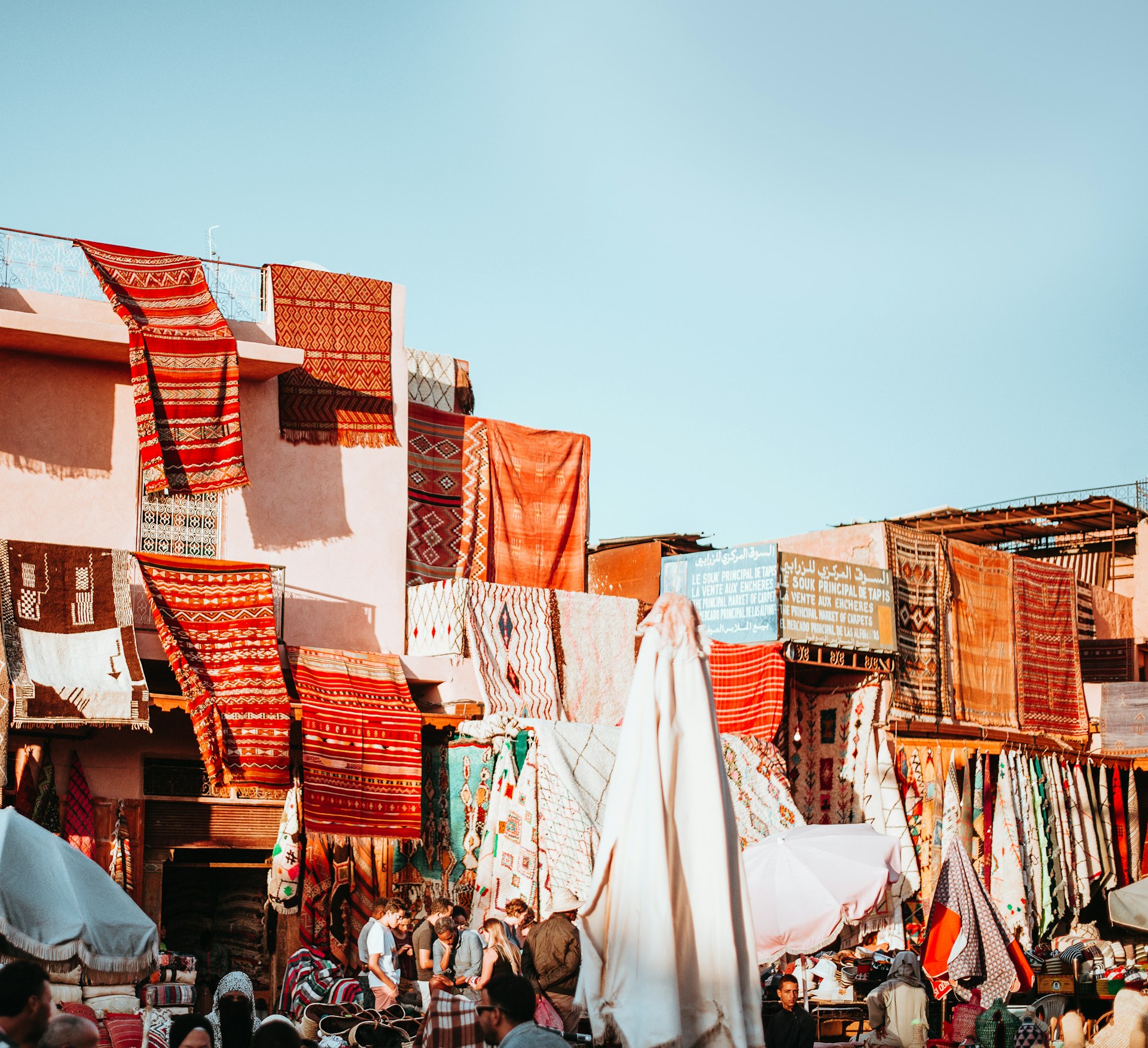 assorted-color textiles hanging on roof