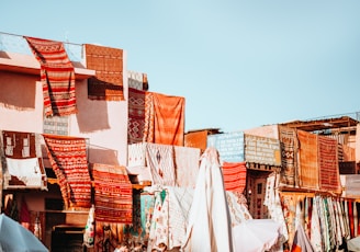 assorted-color textiles hanging on roof