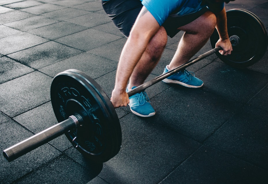 person about to lift barbell