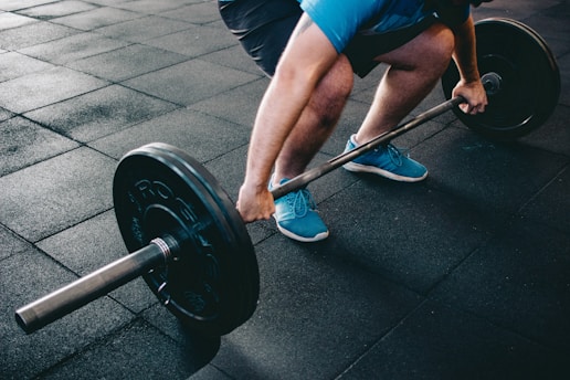 person about to lift barbell