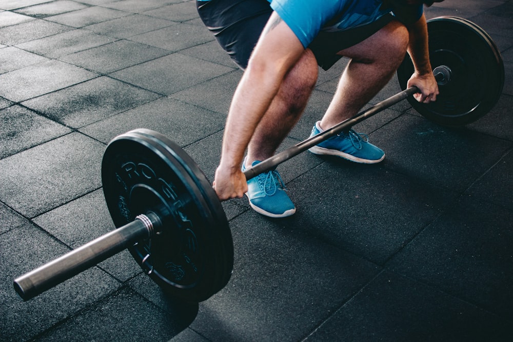 person about to lift barbell