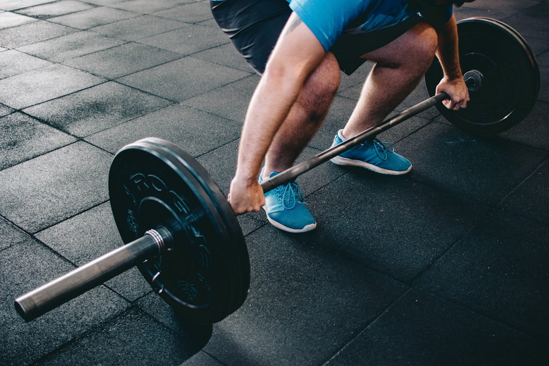 person about to lift barbell