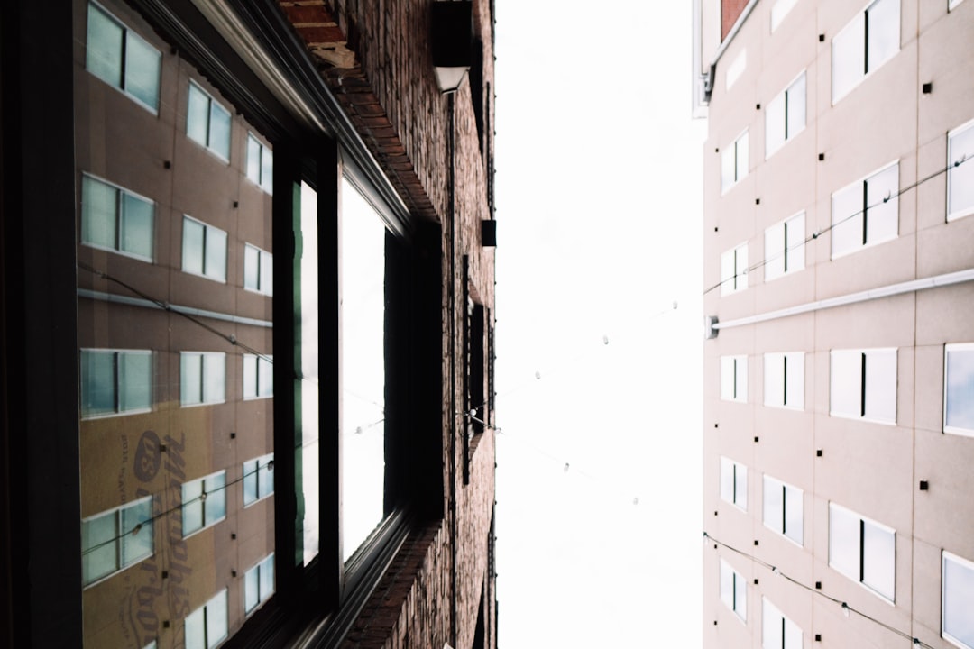 low angle photography of two high-rise buildings, Look up