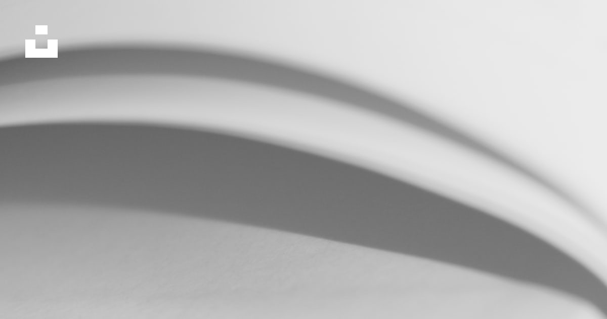 The shadow of an object on a white surface photo – Free White Image on ...