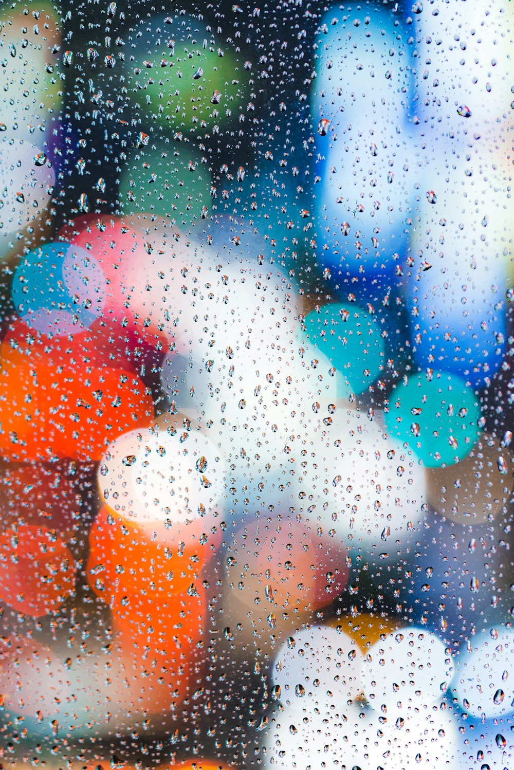 glass with water drops bokeh photography