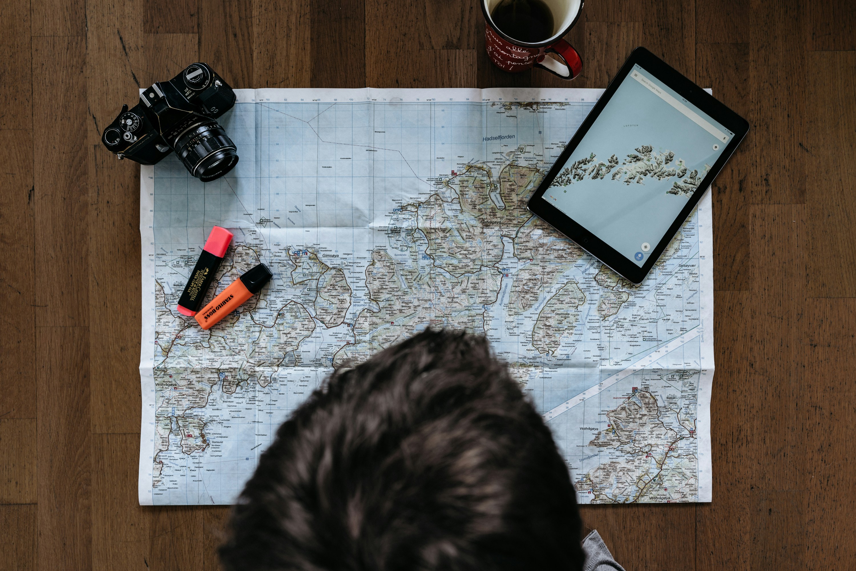 Teen Traveler Looking at Maps