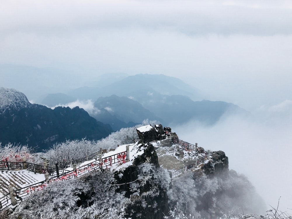 aerial view photography of white and gray building near mountains