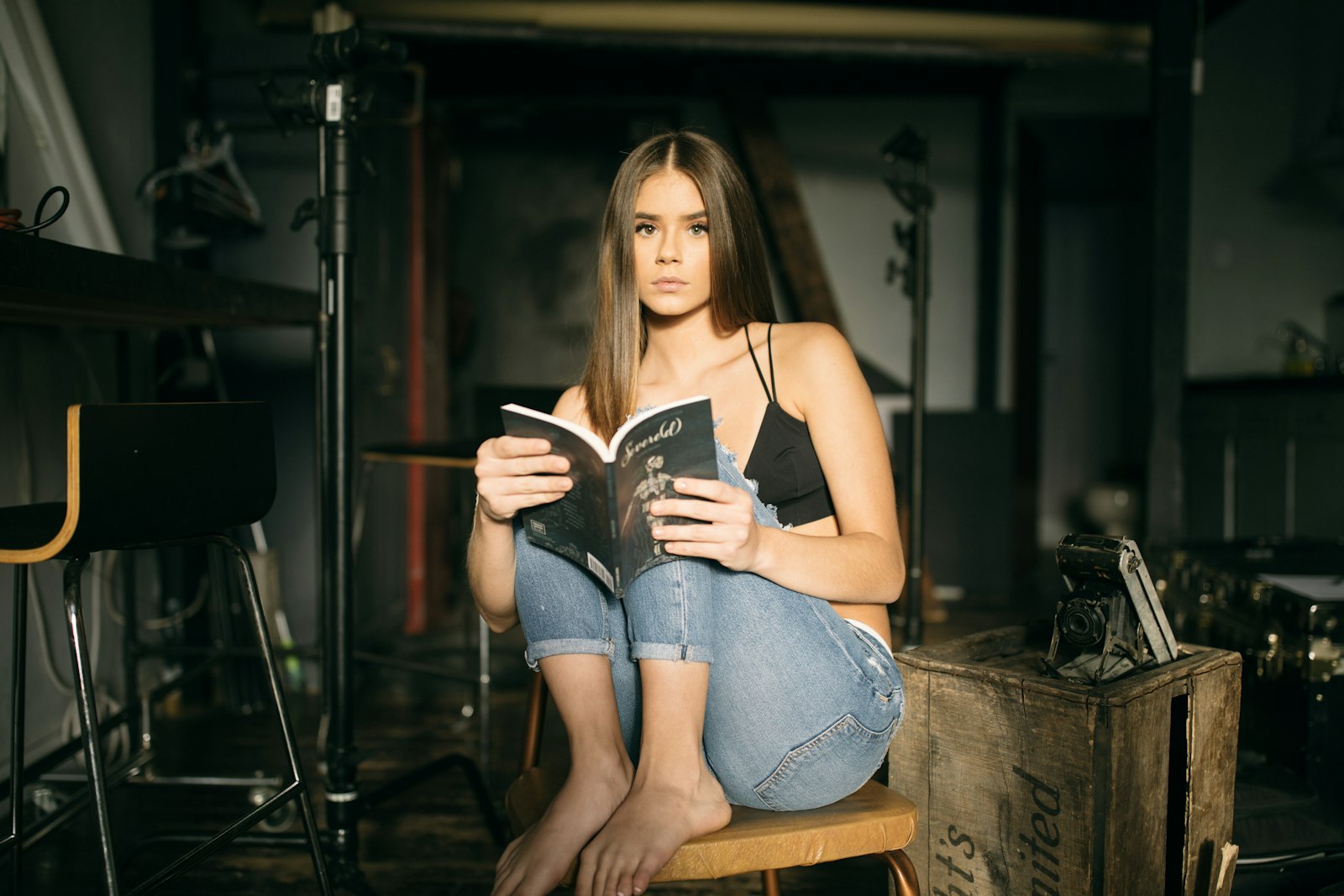 Canon EF 35mm F1.4L II USM sample photo. Woman sitting on brown photography