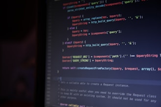A computer screen is displaying lines of colorful code. The syntax is highlighted in different colors, with keywords in red, operators in blue, and strings in green. The code appears to involve data query and replacement functions.