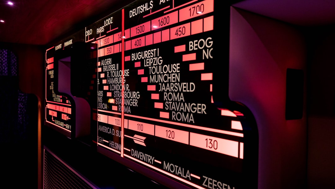 white destination signage, This is an oldschool flightboard to see which flight is going where. I was in the Institute f
