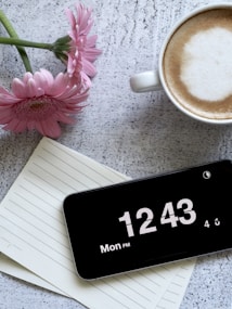 black smartphone displaying 12:43