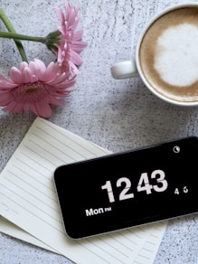 black smartphone displaying 12:43