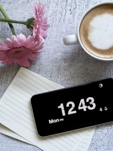 black smartphone displaying 12:43