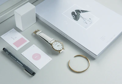 Minimalist digital planner open on a sleek, black background with golden accents.