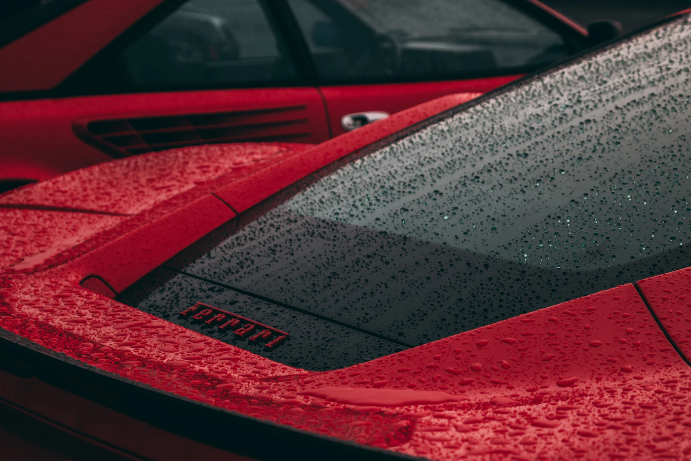 Red Ferrari supercar, representative of high-value vehicles T2T transports