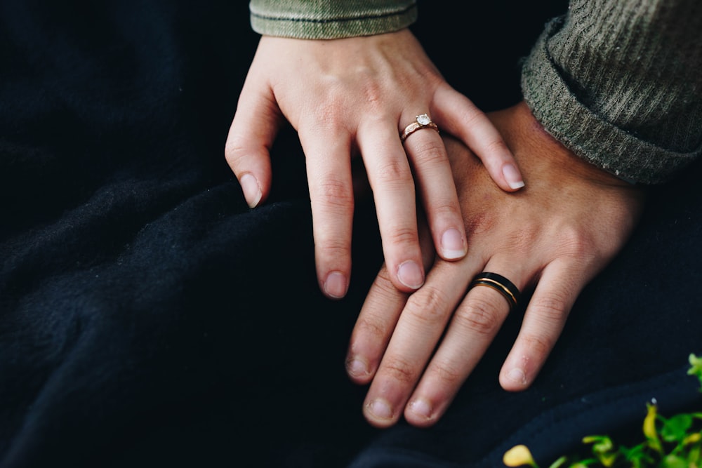 woman holding hand of man