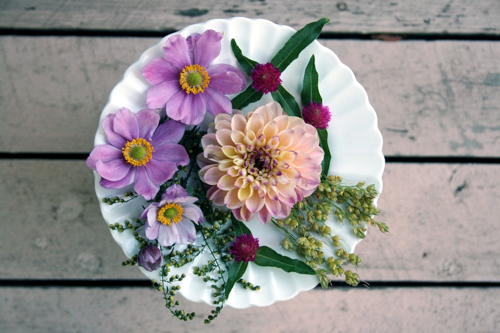 flowers on white ceramic plate