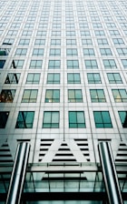 high-rise gray concrete building during daytime
