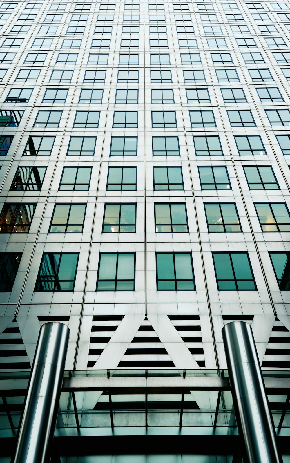 high-rise gray concrete building during daytime