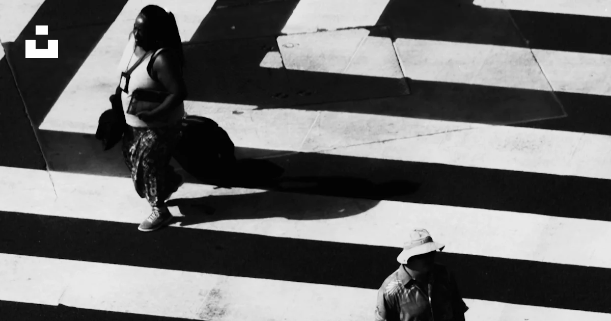Woman And Man Waling On White And Black Striped Road Photo Free Santa woman-and-man-waling-on-white-and-black-striped-road-photo-free-santa