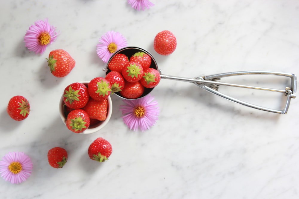 strawberries on gray steel scooper