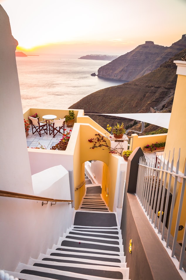 a stairway into the ocean in Santorini, Greece