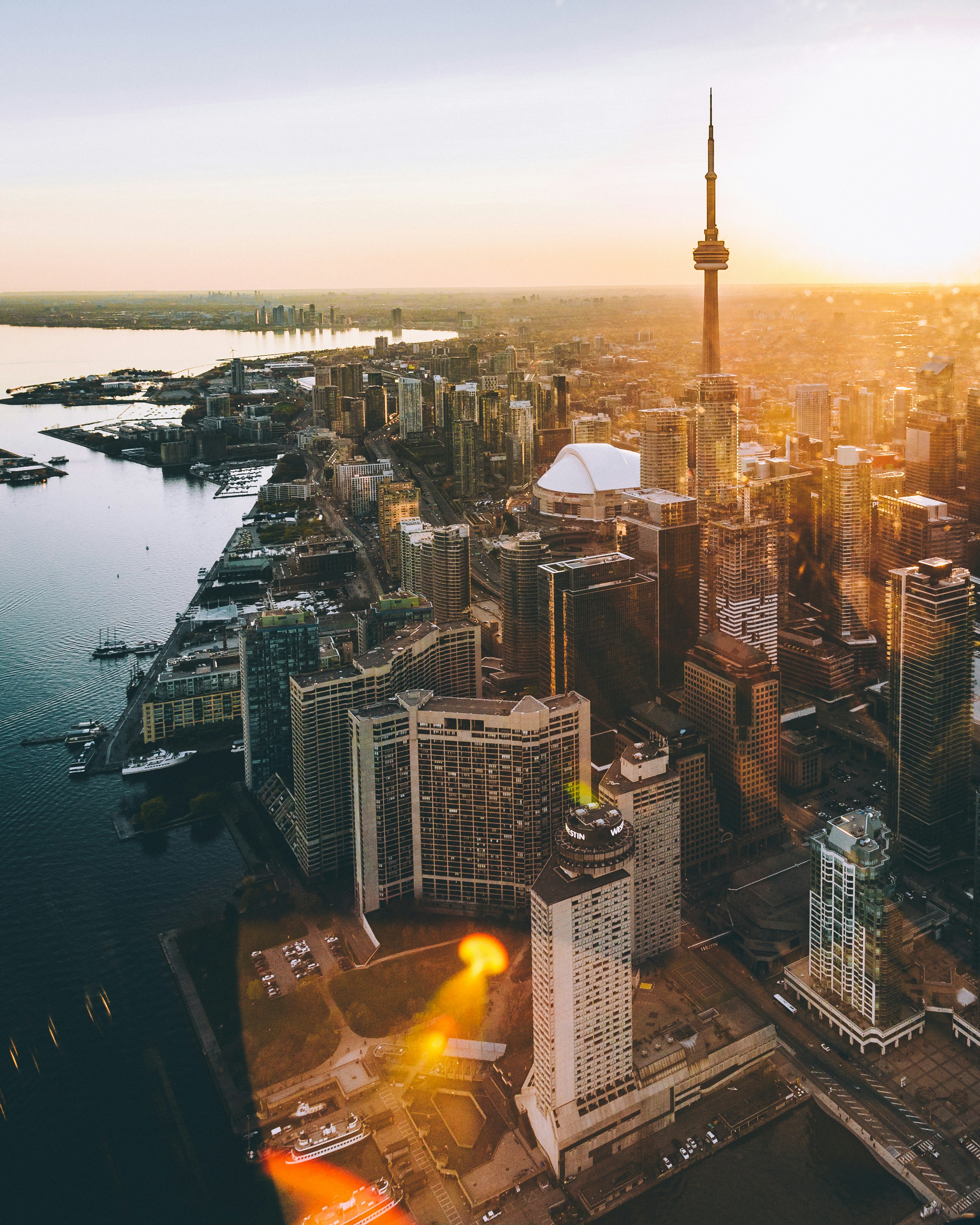 Sunset helicopter tour over downtown Toronto. Another beautiful day in a beautiful city. If you ever get a chance to see a city by air go for it, you wont regret it!
