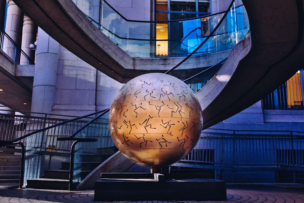 globe statue inside building