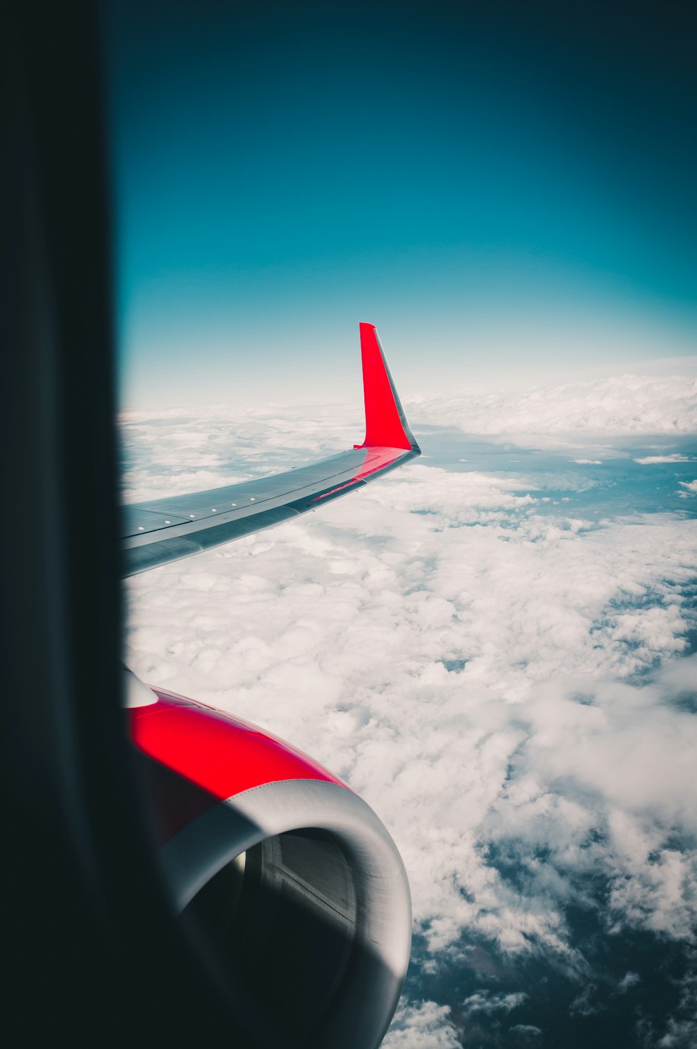 gray and red airplane