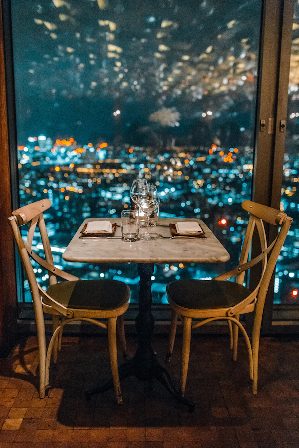 A couple having a conversation over a restaurant meal