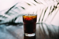 Refreshing cold beverages in glasses with condensation on the outside.