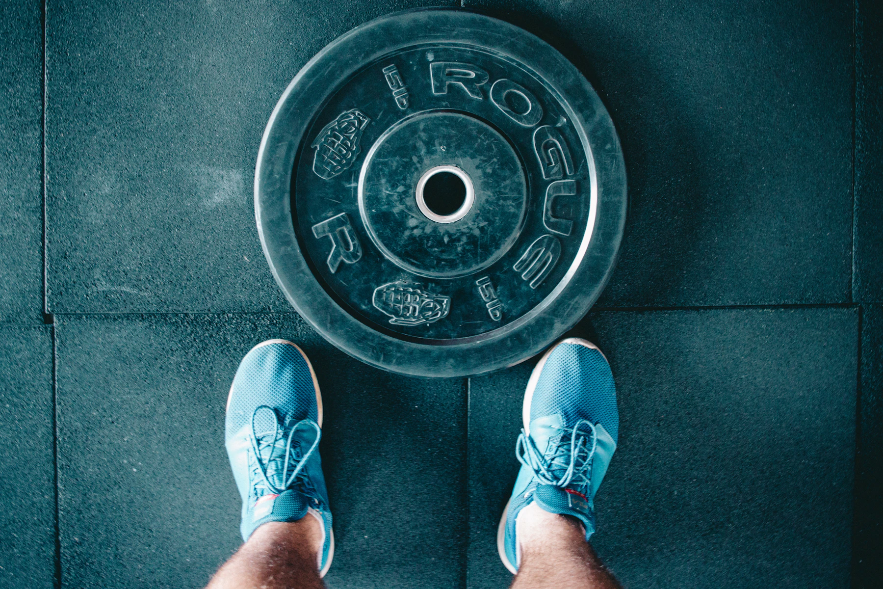 Athlete training with performance fitness equipment