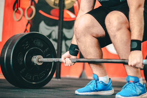 Athlete holding a barbell for powerlifting