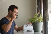 A quiet corner with a journal and a cup of tea, representing personal introspection.