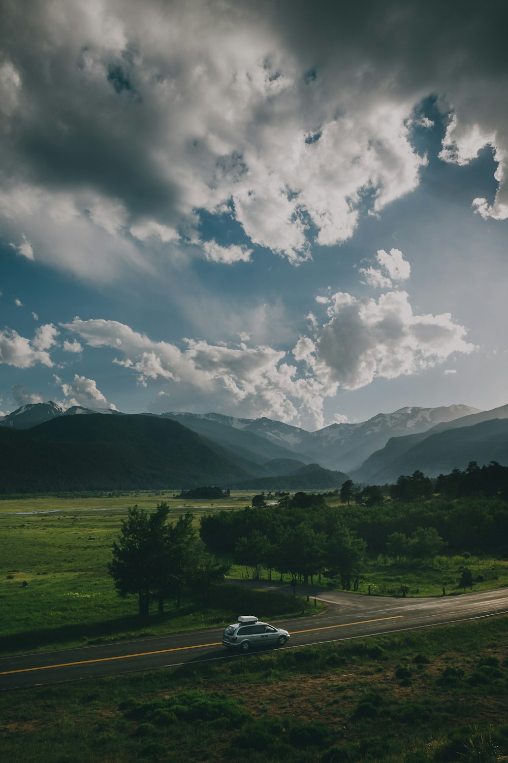 silver car near mountain during daytime